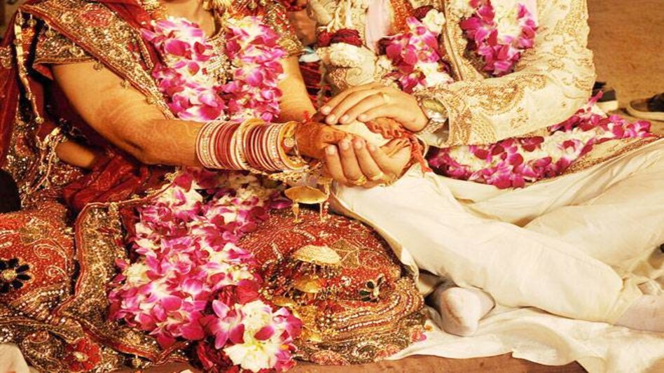 RBI eases condition for up to Rs 2.5 lakh withdrawal for wedding purpose RBI eases condition for up to Rs 2.5 lakh withdrawal for wedding purpose