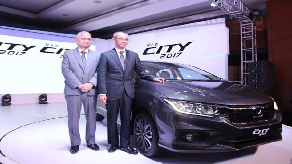(R-L) Mr Yoichiro Ueno, President and CEO & Mr Raman Kumar Sharma, VP, Honda Cars India Ltd at the launch of New City 2017 (R-L) Mr Yoichiro Ueno, President and CEO & Mr Raman Kumar Sharma, VP, Honda Cars India Ltd at the launch of New City 2017