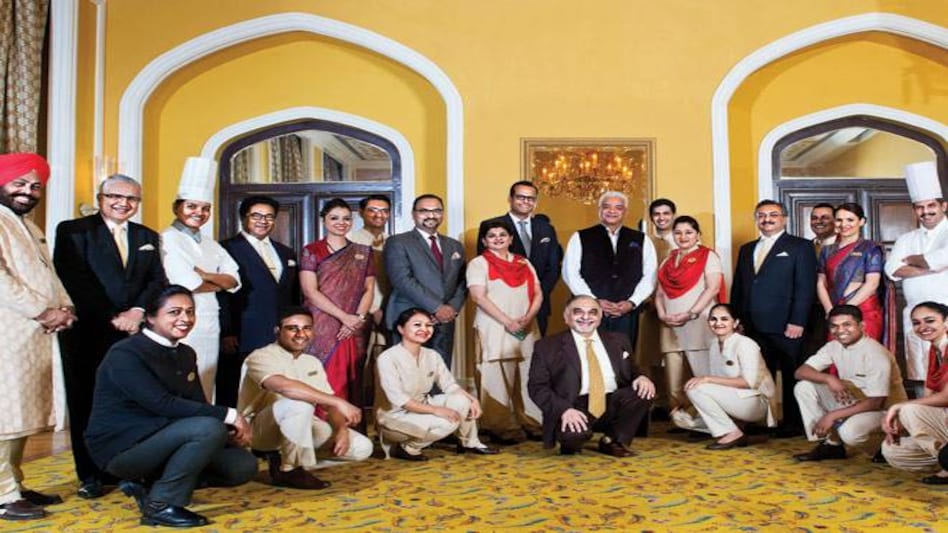 Rakesh Sarna, MD&CEO, Indian Hotels(standing, centre) with employees (Pic: Rachit Goswami) Rakesh Sarna, MD&CEO, Indian Hotels(standing, centre) with employees (Pic: Rachit Goswami)