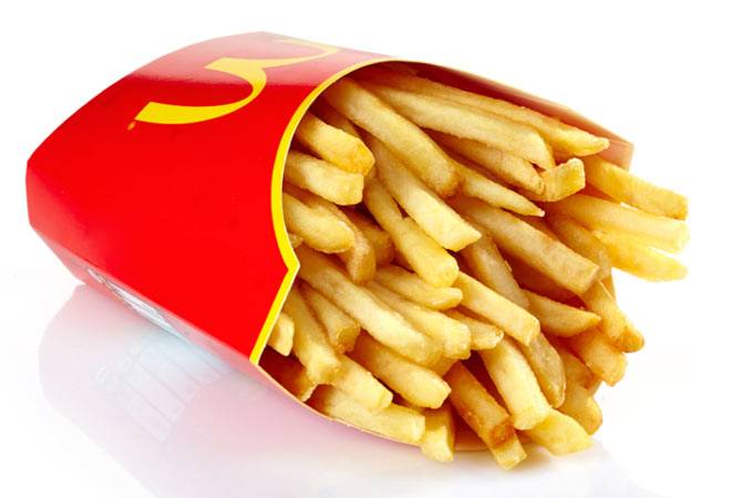 Not loving it anymore! Dead lizard served with french fries at McDonald's outlet in Kolkata