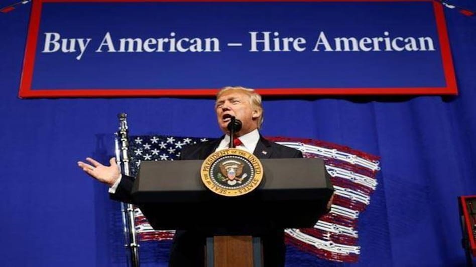 US accuses TCS, Infosys of violating H-1B visa norms US accuses TCS, Infosys of violating H-1B visa norms