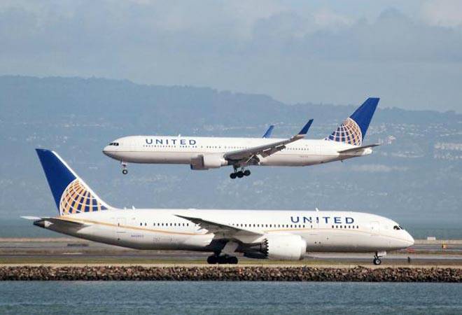 United Airlines under fire after passenger dragged from an overbooked plane