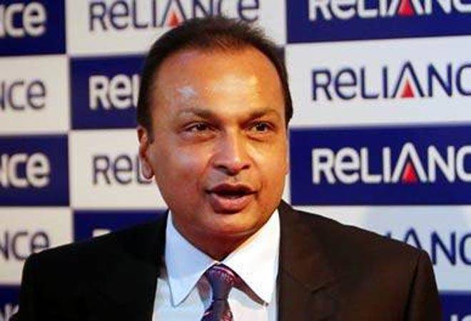 Fitch says Reliance Communications defaulting on debt is a real possibility, puts it into lower junk rating