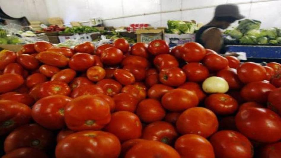 Congress opens 'State Bank of Tomato' in Lucknow to protest against rising prices Congress opens 'State Bank of Tomato' in Lucknow to protest against rising prices