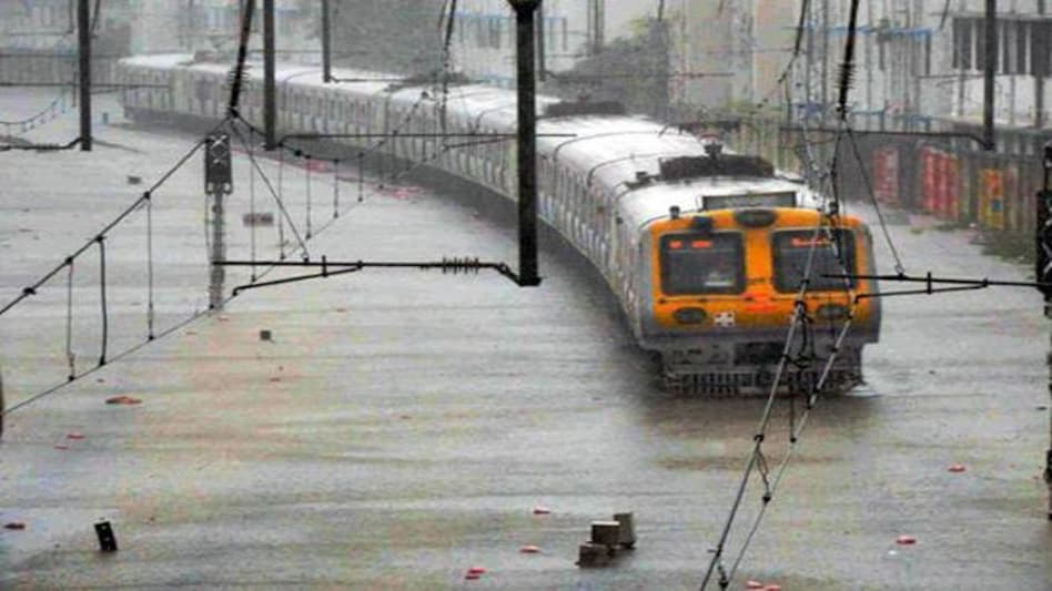 Mumbai rains: Local trains, air services disrupted, schools and colleges to remain shut today Mumbai rains: Local trains, air services disrupted, schools and colleges to remain shut today