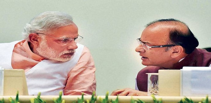 Finance Minister Arun Jaitley with senior Finance Ministry officials after a press conference today. Image: PTI Finance Minister Arun Jaitley with senior Finance Ministry officials after a press conference today. Image: PTI