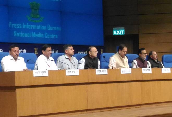 Arun Jaitley and senior FInance Ministry officials during a press conference.