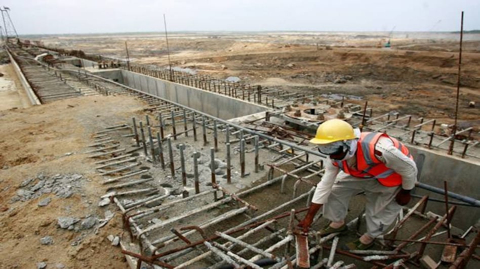 A construction worker at the Hambantota sea port. (File image) Image: Reuters A construction worker at the Hambantota sea port. (File image) Image: Reuters