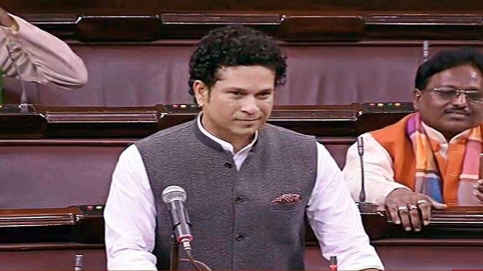 TV grab of Sachin Tendulkar waiting for Congress MPs to stop shouting so that he can speak. Image: PTI TV grab of Sachin Tendulkar waiting for Congress MPs to stop shouting so that he can speak. Image: PTI