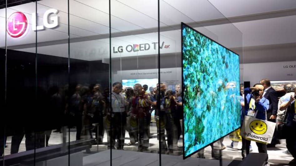LG reveals 65-inch OLED rollable TV, 4K Projector, refrigerator with 29-inch touch screen LG reveals 65-inch OLED rollable TV, 4K Projector, refrigerator with 29-inch touch screen