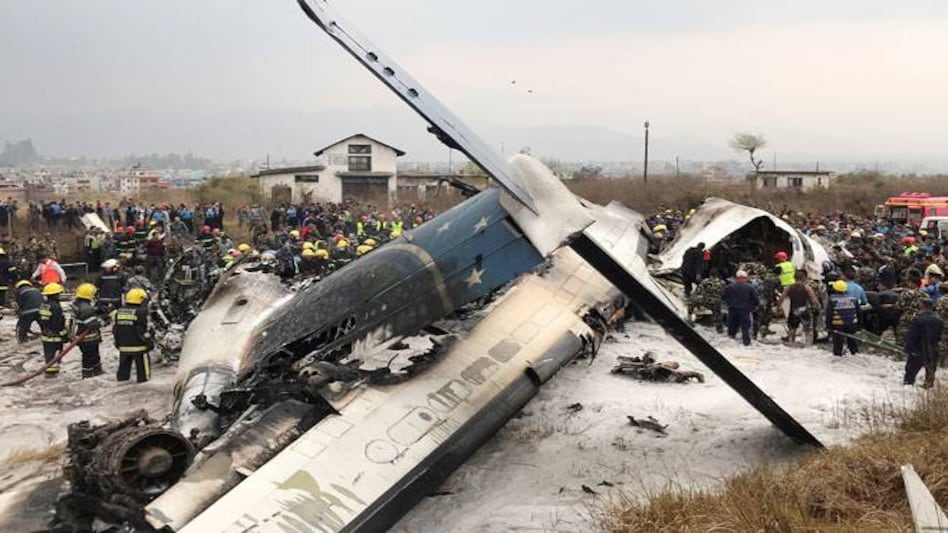 Debris of airplane is pictured as rescue workers operate at Kathmandu airport, Nepal March 12, 2018. (Photo: Reuters) Debris of airplane is pictured as rescue workers operate at Kathmandu airport, Nepal March 12, 2018. (Photo: Reuters)