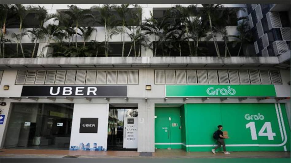 Uber sells Southeast Asia operations to Singapore-based Grab Uber sells Southeast Asia operations to Singapore-based Grab