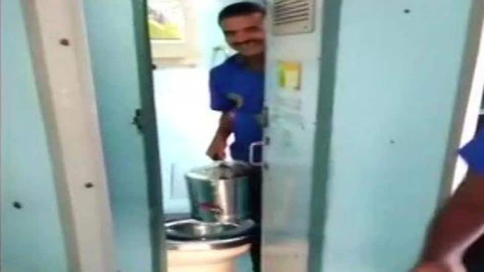 Railways contractor fined Rs 1 lakh after video shows vendor coming out of toilet with tea, coffee cans Railways contractor fined Rs 1 lakh after video shows vendor coming out of toilet with tea, coffee cans