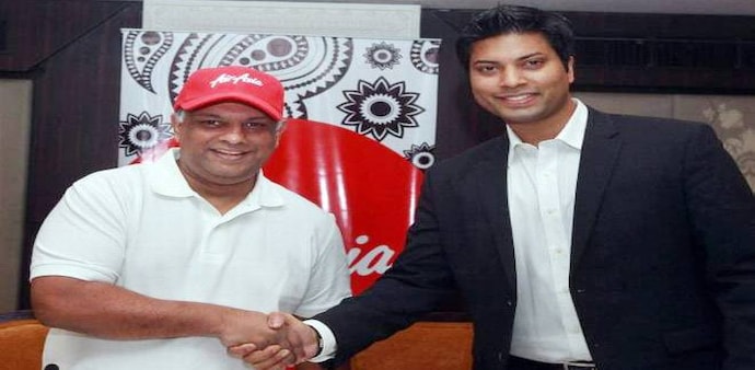 Tony Fernandes (L) with Mitu Chandilya during a press conference in 2013. Tony Fernandes (L) with Mitu Chandilya during a press conference in 2013.
