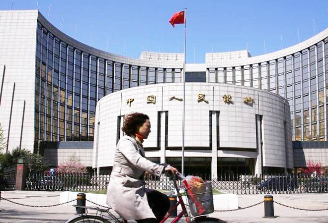 As trade war looms, China cuts some banks' reserve requirements to boost lending