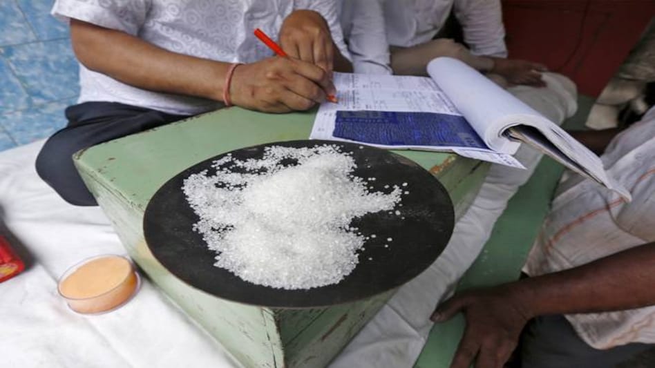 Sample of sugar at the table of a trader at a wholesale market. Image: Reuters Sample of sugar at the table of a trader at a wholesale market. Image: Reuters