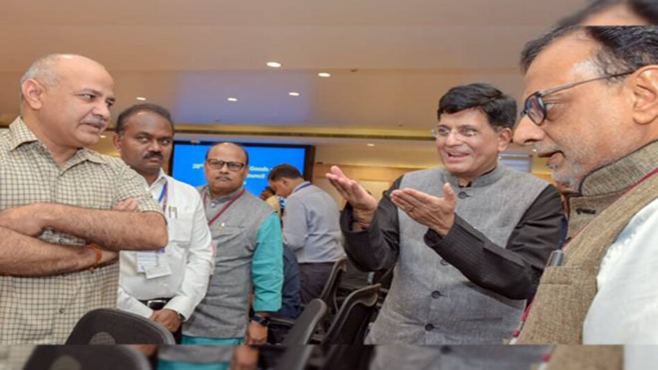 Interim Union Finance Minister Piyush Goyal (C), Delhi's Finance Minister Manish Sisodia (L) and Finance Secretary Hasmukh Adhia (R) before the 28th GST Council Meeting at Vigyan Bhawan. Image: PTI Interim Union Finance Minister Piyush Goyal (C), Delhi's Finance Minister Manish Sisodia (L) and Finance Secretary Hasmukh Adhia (R) before the 28th GST Council Meeting at Vigyan Bhawan. Image: PTI