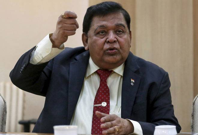 AM Naik asks marshals to throw out shareholders for questioning his cancer hospital on company land