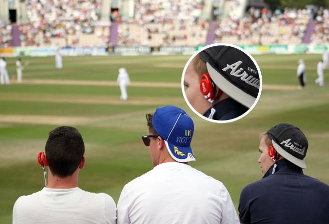 Spectators seen wearing the live commentary radio earpieces during a cricket match. Image: Sound Decisions Spectators seen wearing the live commentary radio earpieces during a cricket match. Image: Sound Decisions