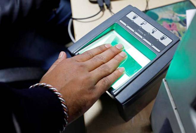 Aadhaar Verdict: Section 57 struck down; mobile companies, banks cannot demand Aadhaar Aadhaar Verdict: Section 57 struck down; mobile companies, banks cannot demand Aadhaar