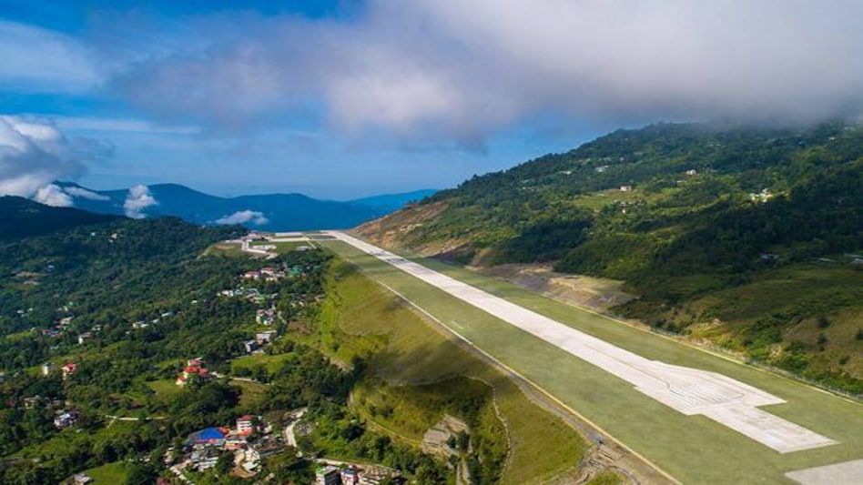 First flight at Sikkim's Pakyong Airport greeted with water cannon salute First flight at Sikkim's Pakyong Airport greeted with water cannon salute