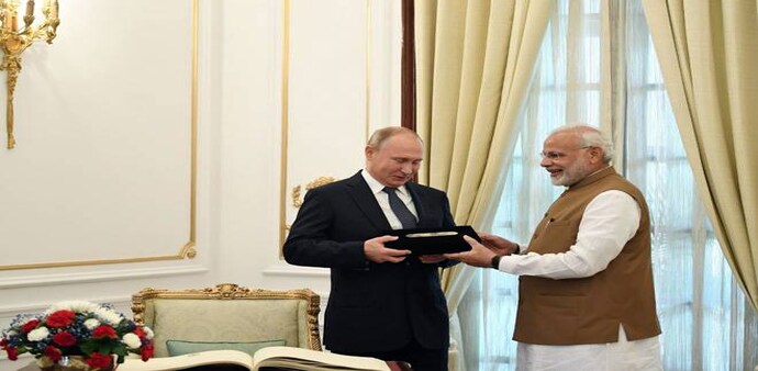Russian President Vladimir Putin with Prime Minister Narendra Modi Russian President Vladimir Putin with Prime Minister Narendra Modi