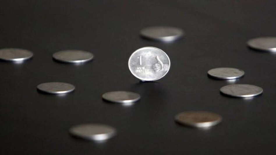 Rupee rebounds from lifetime lows on dollar sale, strong equities; hits IT stocks Rupee rebounds from lifetime lows on dollar sale, strong equities; hits IT stocks