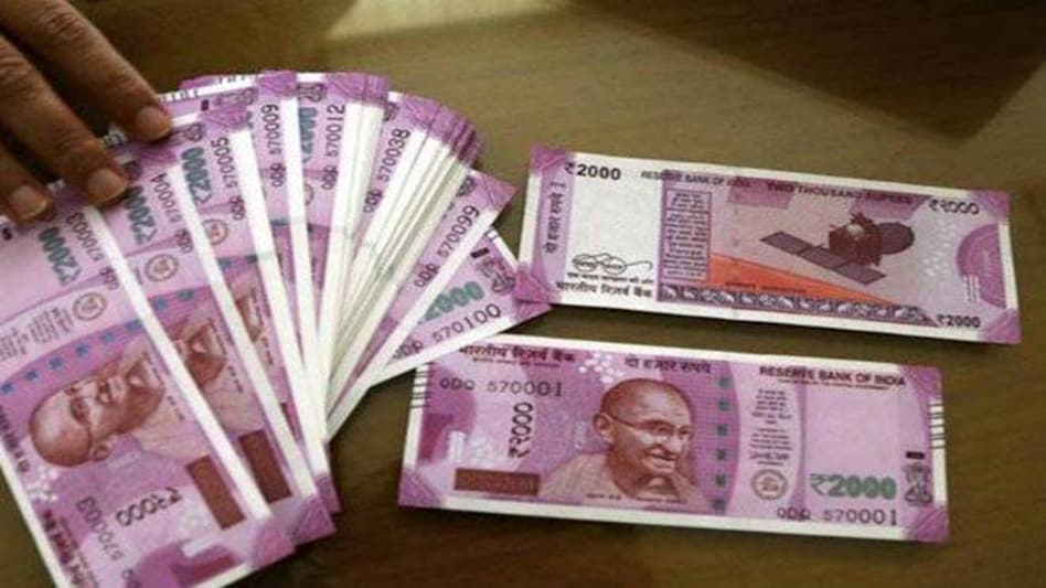 Rupee rises past 70 per dollar on FII inflows, falling crude oil prices Rupee rises past 70 per dollar on FII inflows, falling crude oil prices