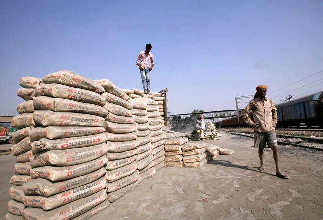 GST rate cut on cement may cost Rs 13,000 crore to exchequer GST rate cut on cement may cost Rs 13,000 crore to exchequer