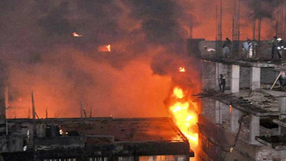 A massive fire killed at least 69 people on Wednesday night as it ripped through several buildings, which were also being used as chemical and plastic warehouses in old Dhaka, Bangladesh. A massive fire killed at least 69 people on Wednesday night as it ripped through several buildings, which were also being used as chemical and plastic warehouses in old Dhaka, Bangladesh.