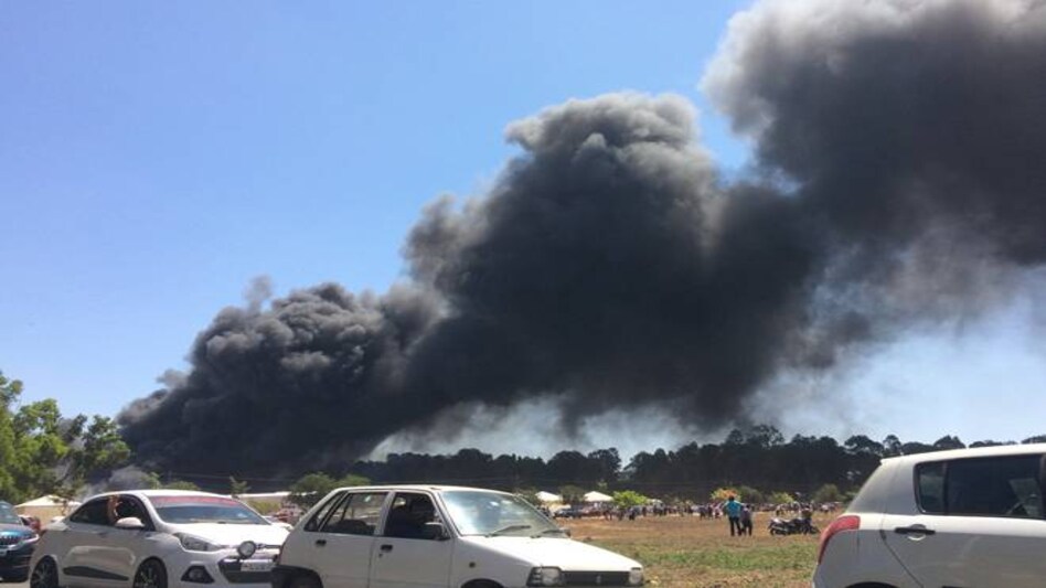 Fire at Aero India Show 2019 damaged 100 cars in the parking lot of Yelahanka Air Force Station. Image source: Twitter Fire at Aero India Show 2019 damaged 100 cars in the parking lot of Yelahanka Air Force Station. Image source: Twitter