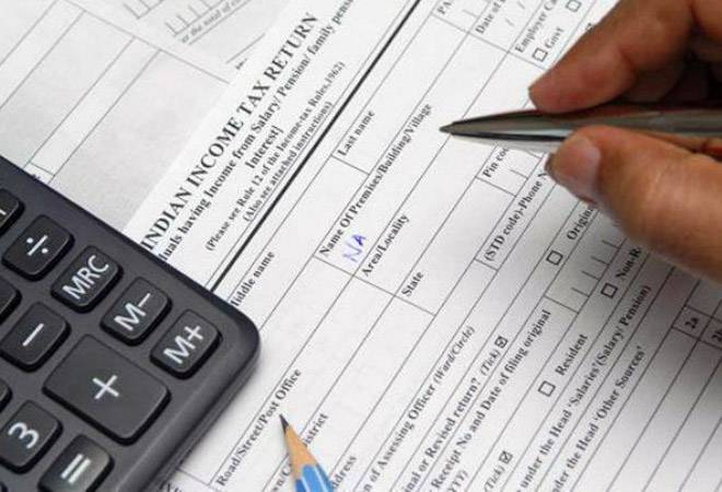 Pre-filled I-T return forms, 'completely faceless' tax assessments in few years: CBDT chairman Pre-filled I-T return forms, 'completely faceless' tax assessments in few years: CBDT chairman