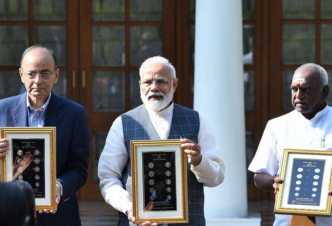 PM Narendra Modi inaugurated the new series coins. PM Narendra Modi inaugurated the new series coins.