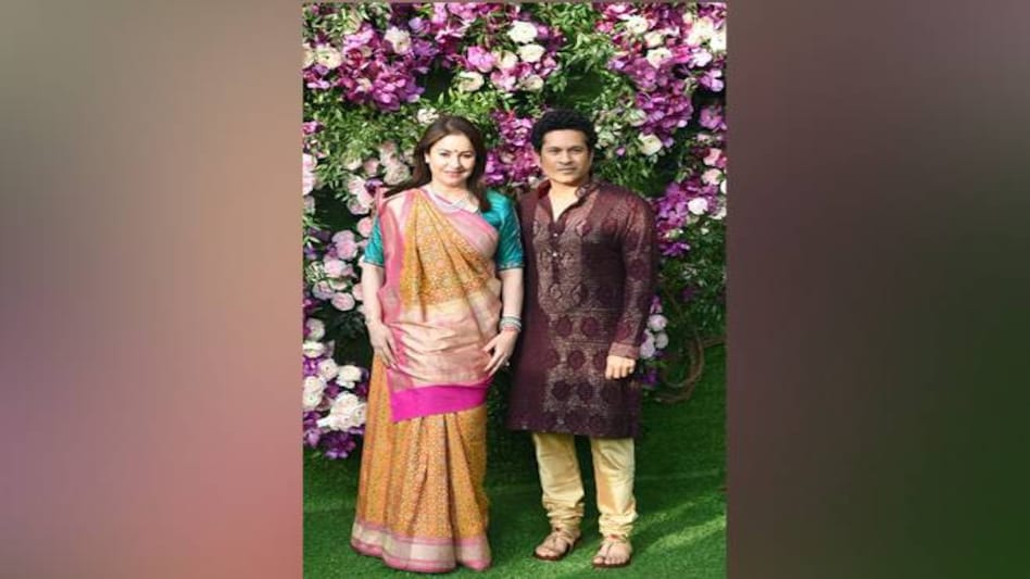 Former Mumbai Indian Captain and mentor Sachin Tendulkar arrived with his wife Anjali at the Akash Ambani and Shloka Mehta's wedding in Mumbai. Former Mumbai Indian Captain and mentor Sachin Tendulkar arrived with his wife Anjali at the Akash Ambani and Shloka Mehta's wedding in Mumbai.