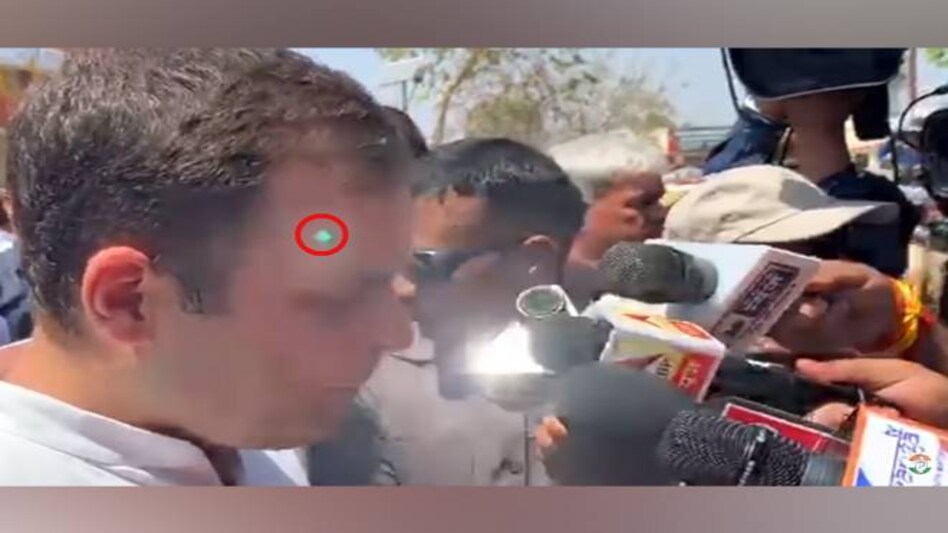 The laser beam was pointed at Rahul Gandhi as he was talking to media personnel after filing his nomination for the Amethi seat. The laser beam was pointed at Rahul Gandhi as he was talking to media personnel after filing his nomination for the Amethi seat.