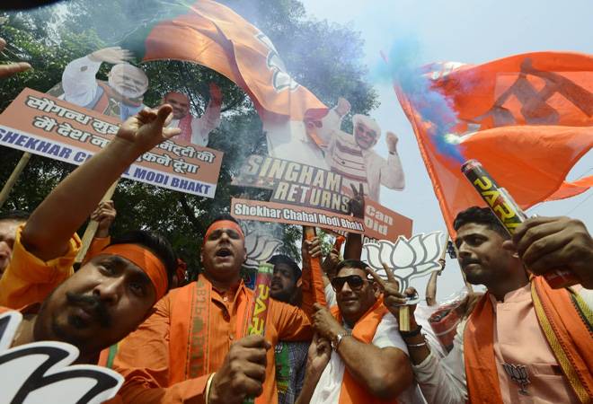 Election Results 2019: BJP supporters burst firecrackers, start celebrations as Modi wave floods nation
