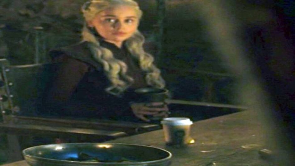 The cup, which was assumed to be from Starbucks, actually came from the production's craft services. The cup, which was assumed to be from Starbucks, actually came from the production's craft services.