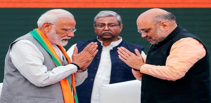 Narendra Modi (Left), BJP President Amit Shah (Right) Narendra Modi (Left), BJP President Amit Shah (Right)