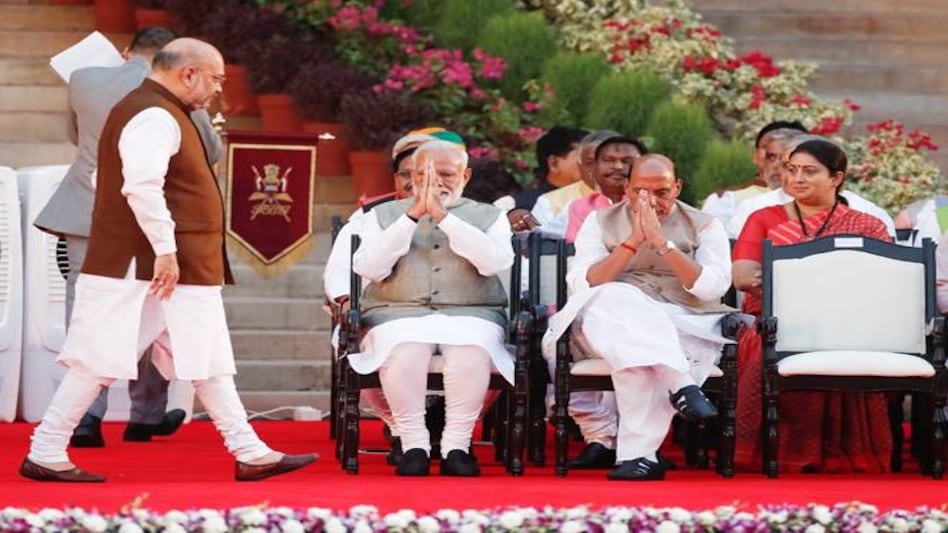 Prime Minister Narendra Modi greets Amit Shah during a swearing-in ceremony at the presidential palace in New Delhi, India May 30, 2019. Photo: Reuters Prime Minister Narendra Modi greets Amit Shah during a swearing-in ceremony at the presidential palace in New Delhi, India May 30, 2019. Photo: Reuters