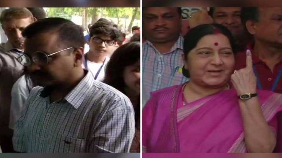 Lok Sabha Election 2019 Phase 6: Sushma Swaraj and Arvind Kejriwal were spotted in a voting line queue in their respective polling booths today. Lok Sabha Election 2019 Phase 6: Sushma Swaraj and Arvind Kejriwal were spotted in a voting line queue in their respective polling booths today.
