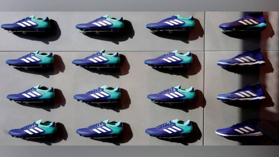 Blow to German sports shoemaker Adidas as it loses EU bid to extend three-stripe trademark Blow to German sports shoemaker Adidas as it loses EU bid to extend three-stripe trademark