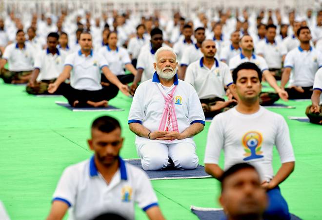 International Yoga Day 2019: PM Modi performs yoga at the Prabhat Tara ground in Ranchi. International Yoga Day 2019: PM Modi performs yoga at the Prabhat Tara ground in Ranchi.