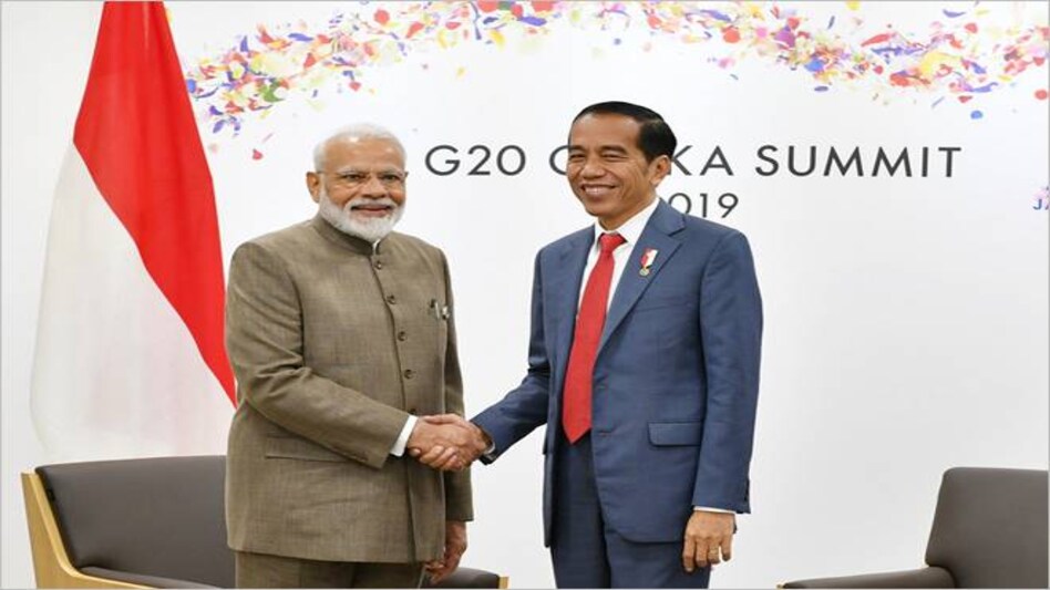 PM Narendra Modi with Indonesian President Joko Widodo at G20 Summit in Osaka. PM Narendra Modi with Indonesian President Joko Widodo at G20 Summit in Osaka.