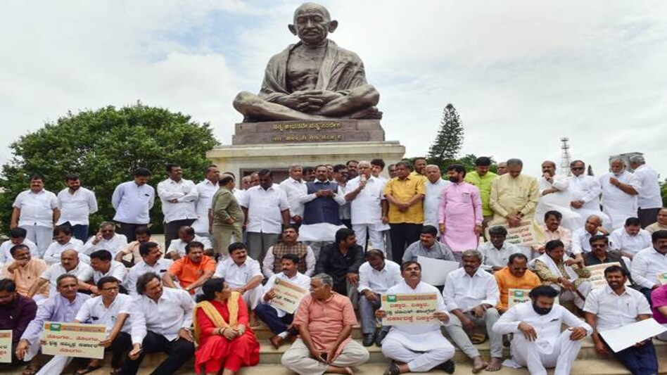Several BJP leaders staged protests before the Mahatma Gandhi statue at the Vidhan Soudha in Bengaluru. Photo credit: PTI Several BJP leaders staged protests before the Mahatma Gandhi statue at the Vidhan Soudha in Bengaluru. Photo credit: PTI