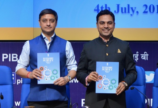 CEA KV Subramanian (right) and Principal Economic Advisor to Finance Ministry Sanjiv Sanyal (left) hold copies of Economic Survey 2019 after a press conference. Photo credit: IANS CEA KV Subramanian (right) and Principal Economic Advisor to Finance Ministry Sanjiv Sanyal (left) hold copies of Economic Survey 2019 after a press conference. Photo credit: IANS