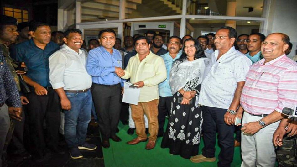 Ten of 15 Congress members led by leader of opposition Chandrakant Kavlekar leave after giving the letter for merger of their faction in BJP to Speaker Rajesh Patnekar, in Panaji (PTI). Ten of 15 Congress members led by leader of opposition Chandrakant Kavlekar leave after giving the letter for merger of their faction in BJP to Speaker Rajesh Patnekar, in Panaji (PTI).