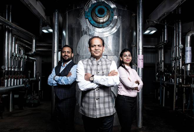 From Left: Ayush, Mukesh and Karuna Kacholia / Photograph by Rachit Goswami From Left: Ayush, Mukesh and Karuna Kacholia / Photograph by Rachit Goswami