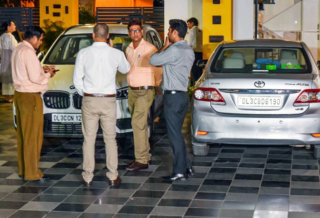 A team of CBI officers had landed at the Chidambaram's posh Jor Bagh residence here to locate him. A team of CBI officers had landed at the Chidambaram's posh Jor Bagh residence here to locate him.