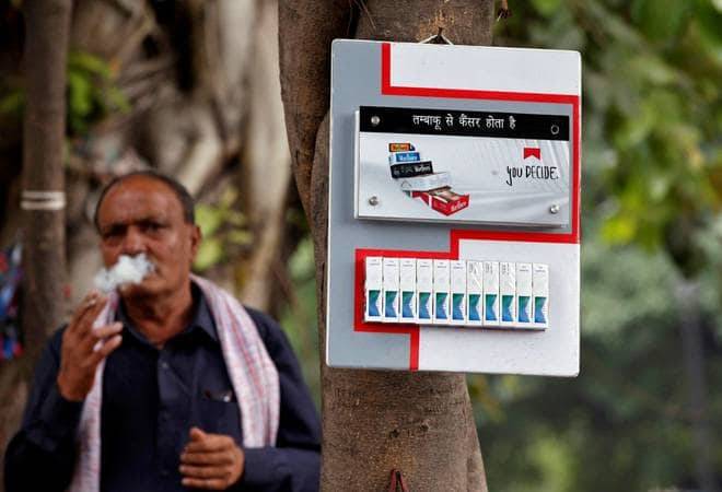 Cigarette maker Godfrey Phillips Saturday announced a twofold jump in its consolidated profit for June quarter at Rs 118.42 crore from Rs 57.31 crore in the year-ago period. Cigarette maker Godfrey Phillips Saturday announced a twofold jump in its consolidated profit for June quarter at Rs 118.42 crore from Rs 57.31 crore in the year-ago period.