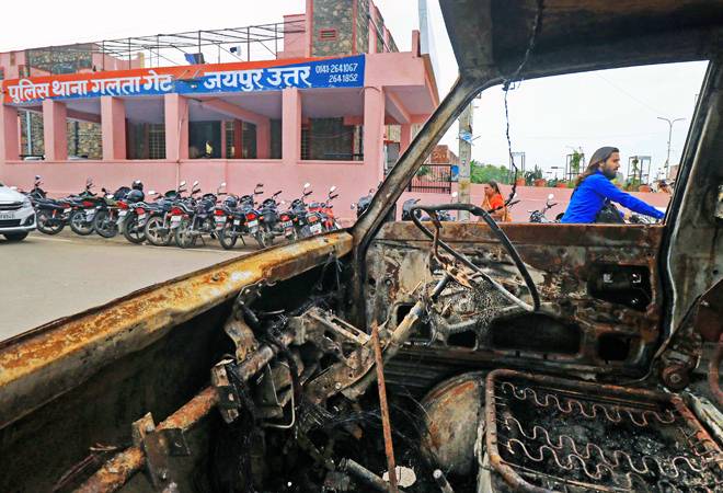 The charred bus which was attacked while ferrying pilgrims, parked at a police staion in Jaipur. (PTI) The charred bus which was attacked while ferrying pilgrims, parked at a police staion in Jaipur. (PTI)